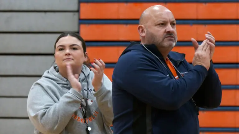 Aly Miller and her dad Scott coaching Naperville North