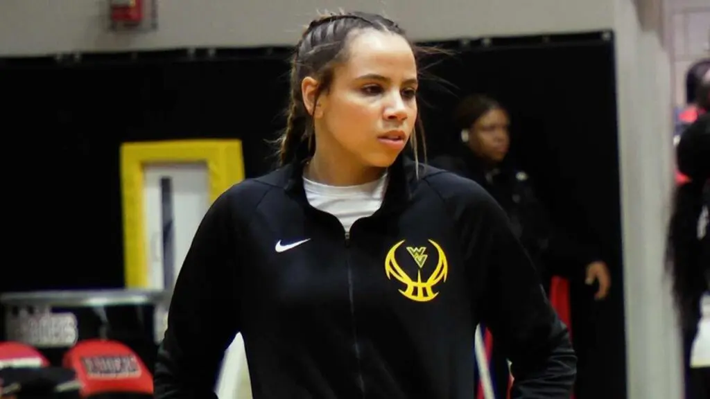 Waubonsie Girls basketball player Danyella Mporokoso warms up before playing Bolingbrook.