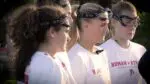 Benet girls lacrosse captains talk to the Nazareth captain before the game.