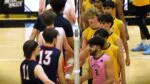 Metea Valley boys volleyball shakes hands with North after a two-set victory.