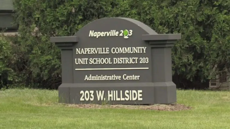 Close up of District 203 administration building sign for story about looking at revenue sources as budget draft nears