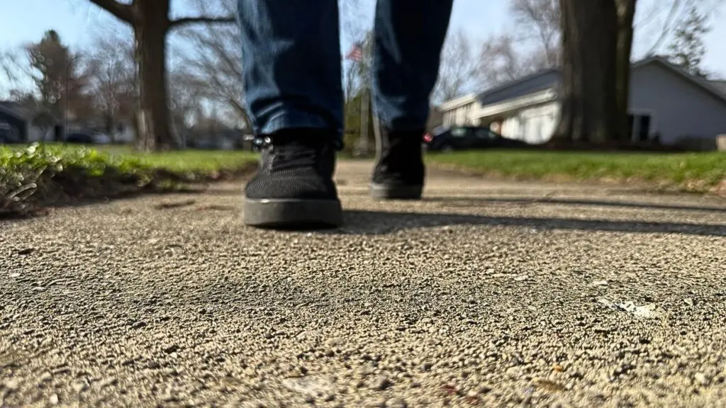 Naperville Ends Sidewalk Cost-Share Program for Now. Person walking on a sidewalk