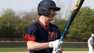 North baseball player up to bat against Metea