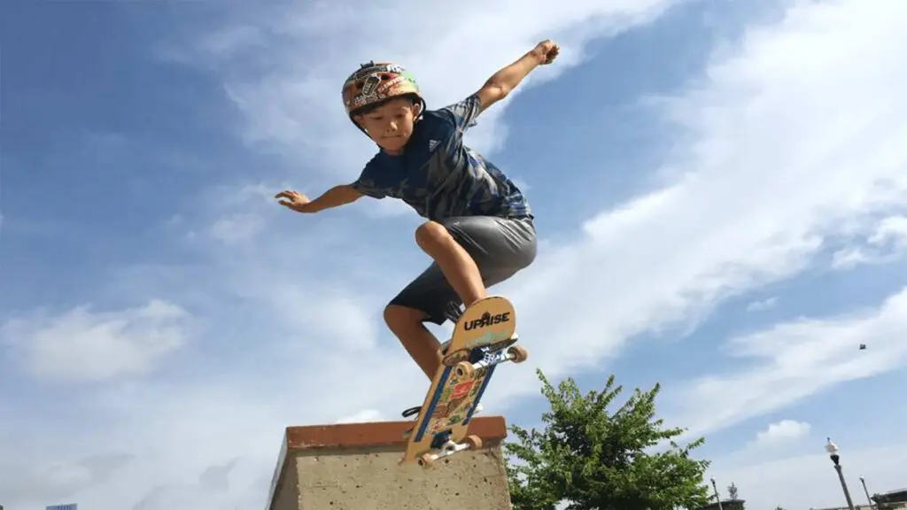 Picture of Max in the air on his skateboard