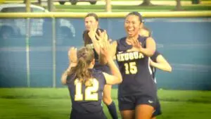 Neuqua Valley girls soccer celebrates a Safa Jeffery goal against Waubonsie Valley.