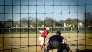 Riley Silvers hitting a home run for Naperville Central softball.