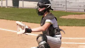 Samantha Hughes behind the plate for Waubonsie Valley softball