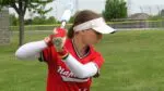 Naperville Central softball player warms up