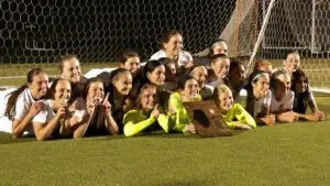 Benet girls soccer with regional plaque