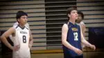 Neuqua Valley boys volleyball warms up for DVC game against Naperville Central.