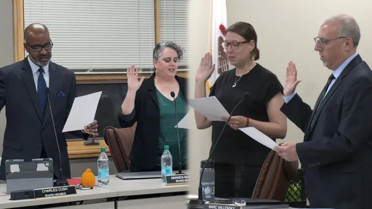 Charles Cush, Amanda McMillen, Holly Blastic and Marc Willensky swear in as new board members for District 203 School Board