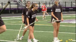 Downers Grove North girls lacrosse team warms up before the IHSA Sectional final against Benet Academy.