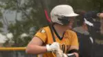 Neuqua Valley catcher Krista Waldusky takes warmup swings before matchup with Oswego East