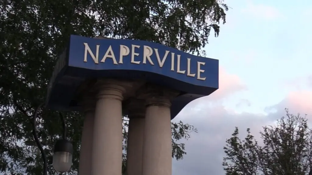 Close up of Naperville sign for story about global leaders visiting Naperville