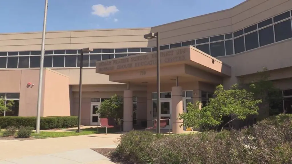 Exterior side angle shot of IPSD 204 Administration Building entrance for budget story