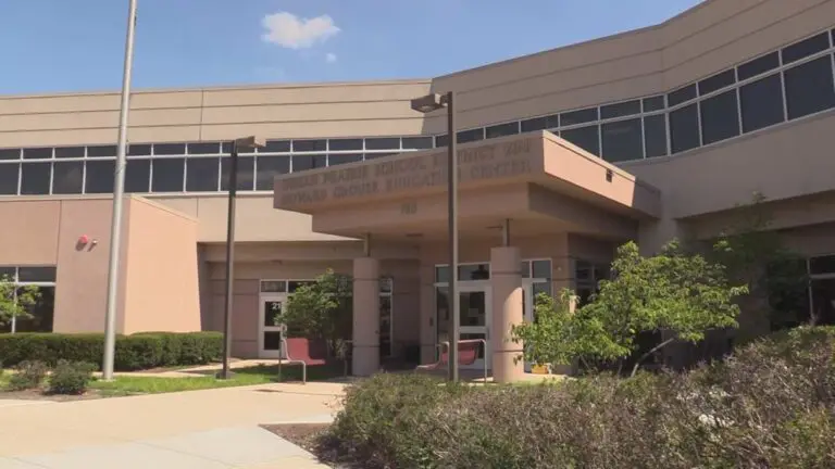 Exterior side angle shot of IPSD 204 Administration Building entrance for budget story