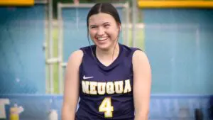 Neuqua Valley girls soccer player, Allessandra Russo smiles during warm ups against Naperville North.