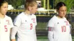 Naperville Central girls soccer players go through lineup intros against Naperville North.