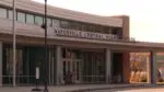 Exterior of front entrance of Naperville Central High School for story on high school course changes