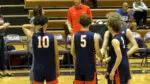 Naperville North takes the court in the boys volleyball regional