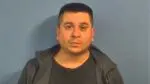 Naperville man Nathan Gonzalez is pictured in his mugshot after killing family dog. Gonzalez killed the pet after an argument with his partner.