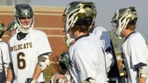 Neuqua boys lacrosse team warms up before taking on Benet Academy.