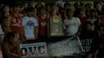 Naperville Central boys track and field poses with DVC title
