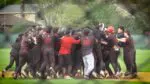 Benet baseball celebrates Quinn Rooney hitting the walk-off against Naperville North.