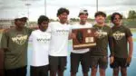 Waubonsie Valley boys tennis smiles with the IHSA Sectional plaque.