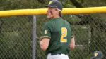 Owen Roberts warms up for Waubonsie Valley baseball