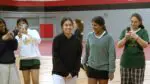 Waubonsie’s Dubey and Cheedepudi smile and walk up to take the first place medals at the IHSA Badminton Sectional at Hinsdale Central.