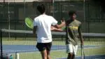 Waubonsie’s Revanth Kothapalli and Ishan Suresh Kumar high five during the DVC One Doubles Championship.