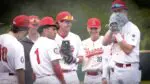 West Aurora Baseball huddles before taking the field against Neuqua Valley in the IHSA Regional Semifinals.