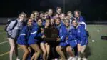 Wheaton North poses with trophy at the Rolling Meadows girls track and field sectional