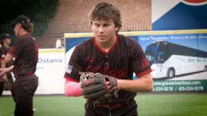 Benet Academy baseball player Nate Cerocke warms up before the IHSA Baseball 3A State Semifinals