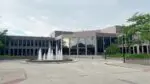 The Naperville Municipal Center with the water fountain on for story on city council debating timing and scope of electricity workshops