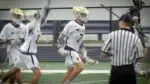Number 7, Jonah Frank, celebrates after beating the Record in the IHSA Boys Lacrosse Sectional.