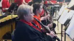A clarinet player on stage during the concert