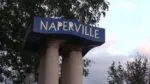 Close up of Naperville sign with tree, sky in background for story on Naperville ranked as third best place in Illinois