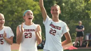 Naperville North's Claire DeCook does the lineup introductions.
