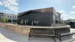 Photo of The George building in downtown Naperville