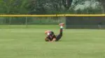 Nikolas Schaefer lays out full extension for a catch for Benet Academy Baseball.