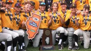 St. Laurence celebrates with the state trophy after winning the IHSA Baseball 3A State Championship.