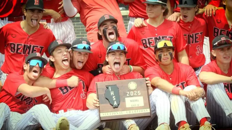 Benet baseball celebrates with the IHSA Sectional plaque after beating St. Francis