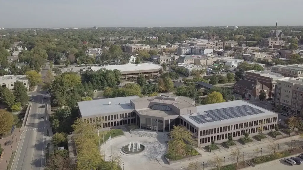 aerial view of downtown Naperville, including the municipal center where a No Kings protest is planned for Saturday, June 14