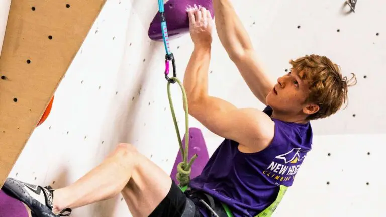 Naperville Central grad Anderson Fuhrer approaches the summit at the Sport Climbing World Championships