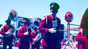 Dick Wheeler in band uniform marching in 1979 Memorial Day Parade