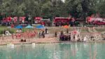 Wide shot of lifeguards and emergency personel at Centennial Beach in Naperville