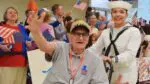 Ralph Bertolacini waving at the crowd at Chicago Midway International Airport