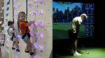 A young girl smiles for the camera while climbing at ABC Climbing Academy, and a young boy plays golf at Naperville's Clubhouse 540, another new business.